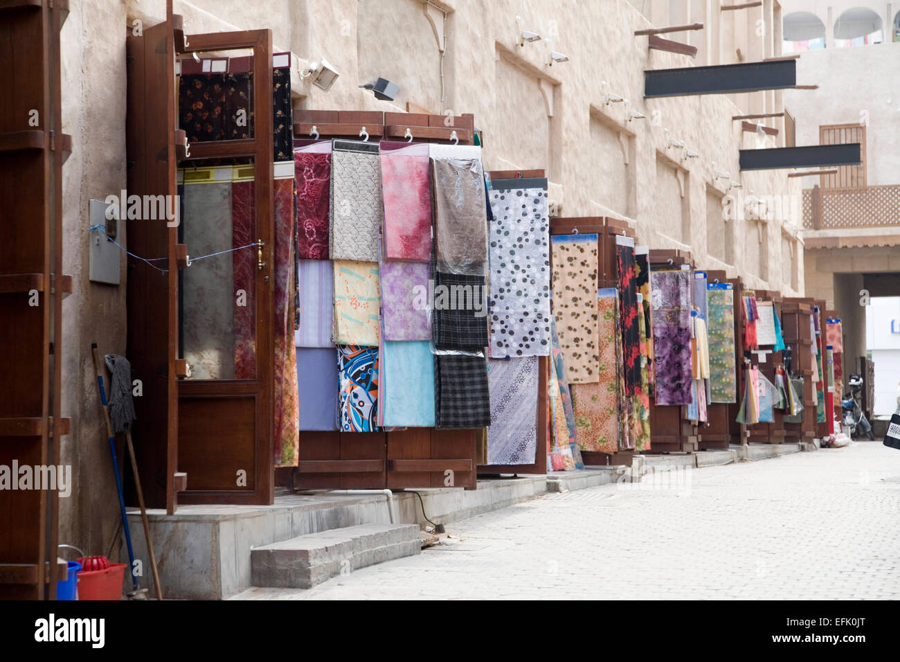 Cloth souk or market selling a multitude of fabrics in Dubai, UAE Stock