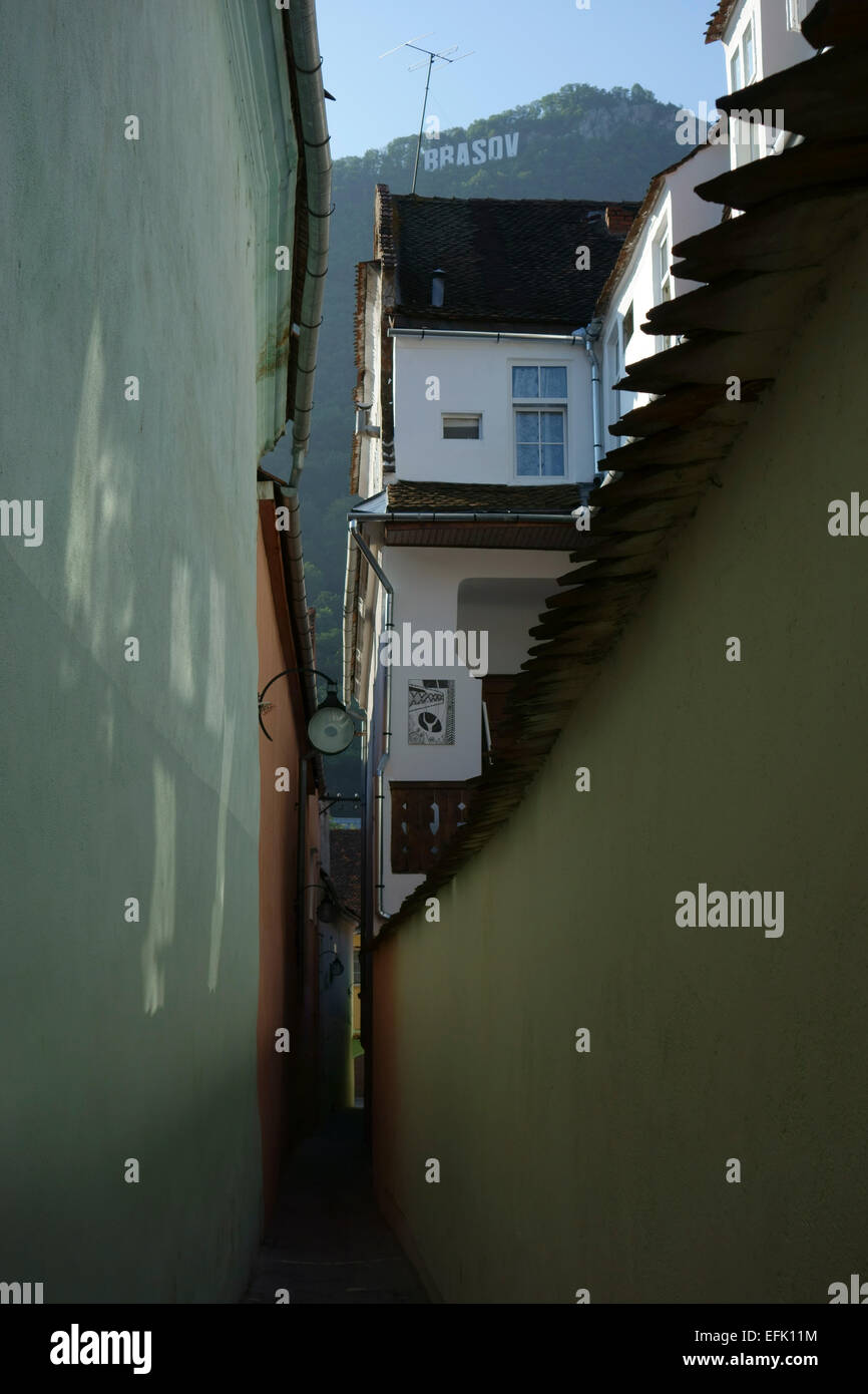 Rope Street or Strada Sforii, one of Europe’s narrowest streets, Brasov, Romania Stock Photo