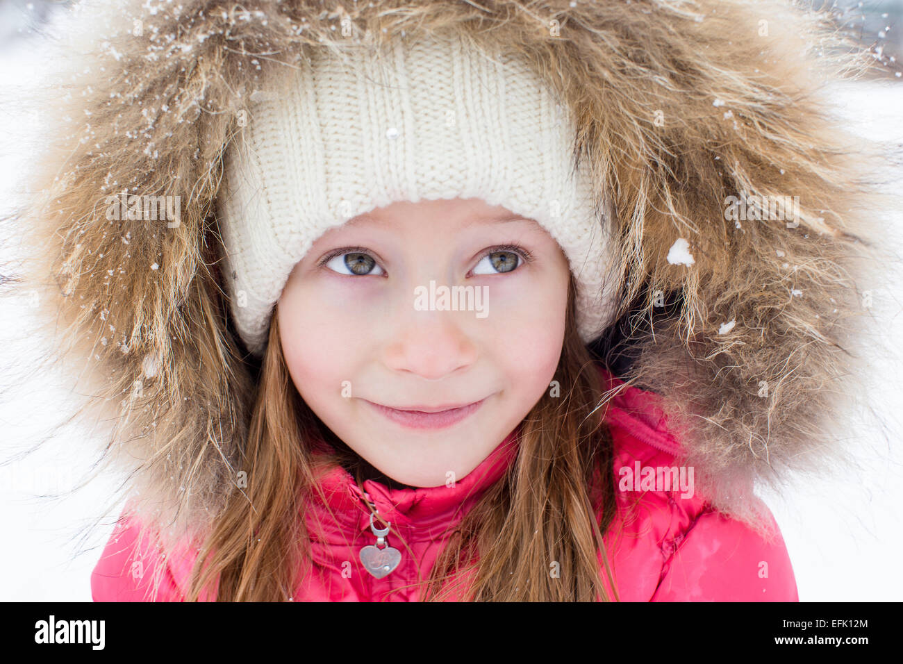 Portrait of adorable little girl outdoors on winter day Stock Photo - Alamy