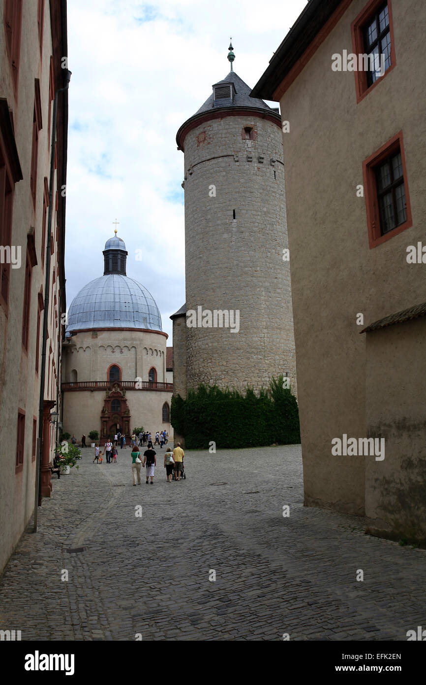The interior courtyard of the fortress Marienberg in Wuerzburg with Bergfried and St. Mary's Church. The fortress is surrounded by vineyards and overlooks the ancient university city with its domes, towers and bridges. Photo: Klaus Nowottnick Date: August Stock Photo