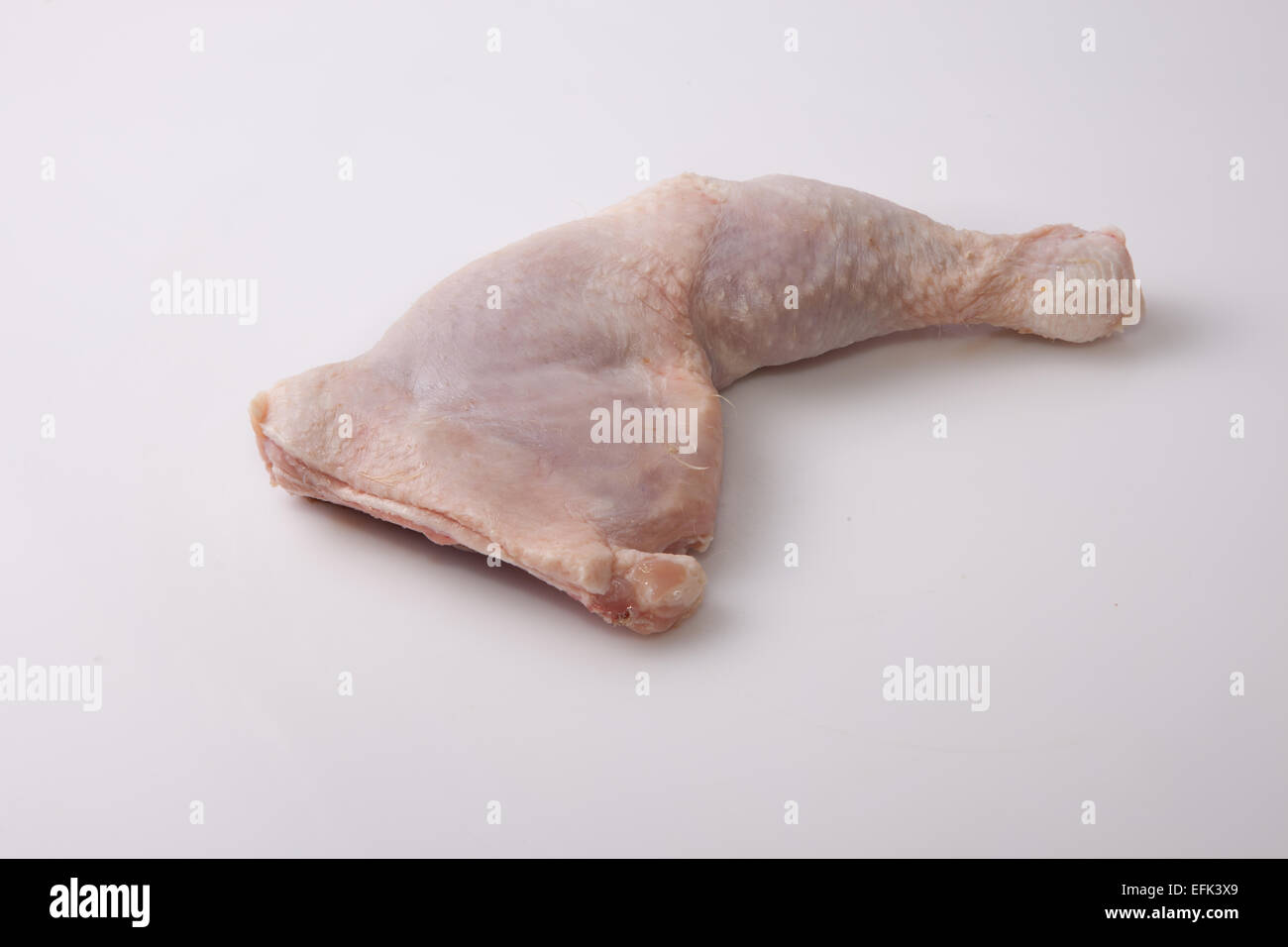 Chicken thigh or leg isolated over white background Stock Photo