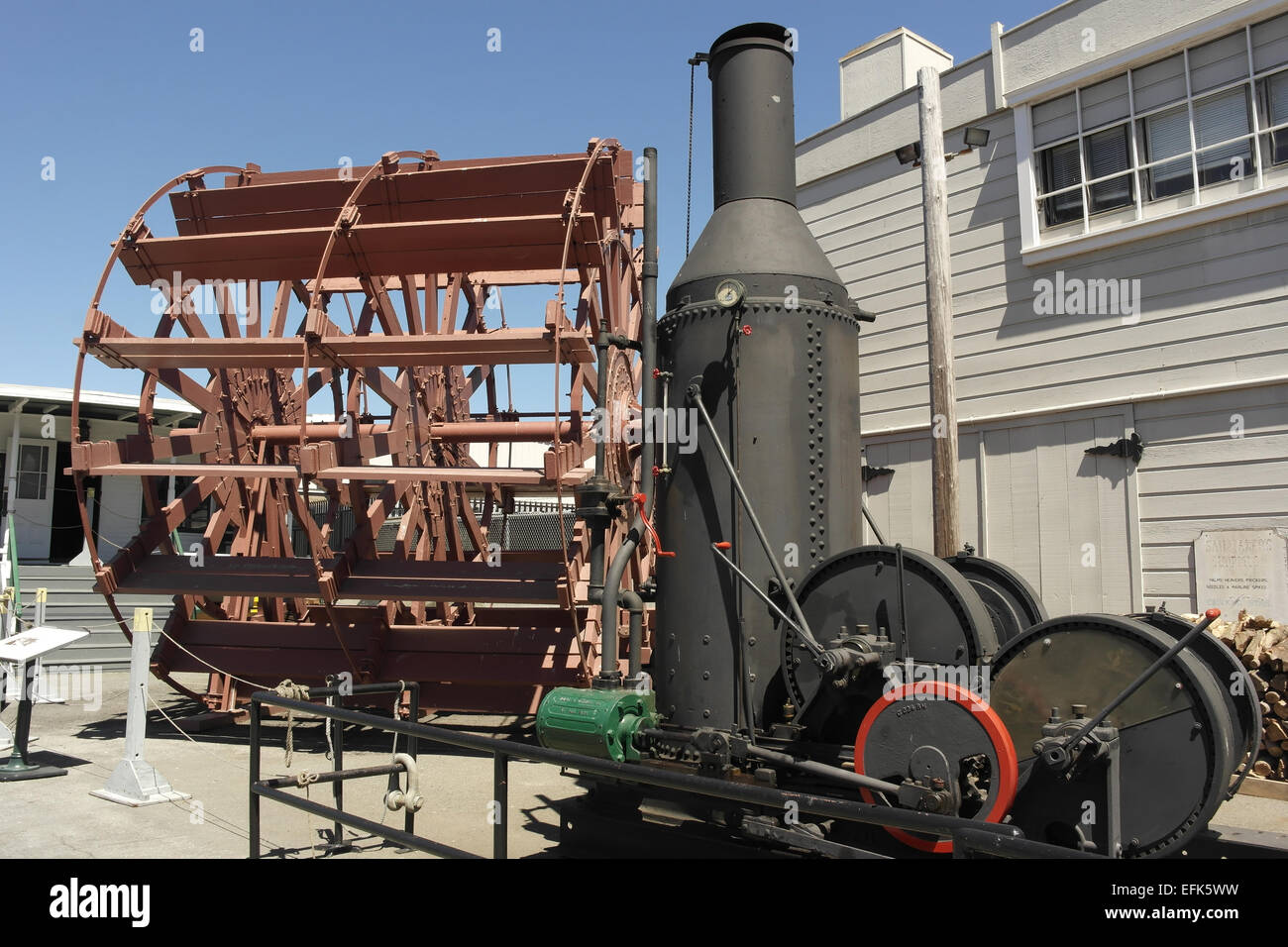 Blue sky view Steam Donkey Engine and Petaluma ferryboat sternwheel, Hyde Street Pier, Fisherman