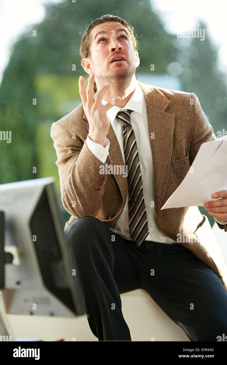 Man stressed out at work Stock Photo