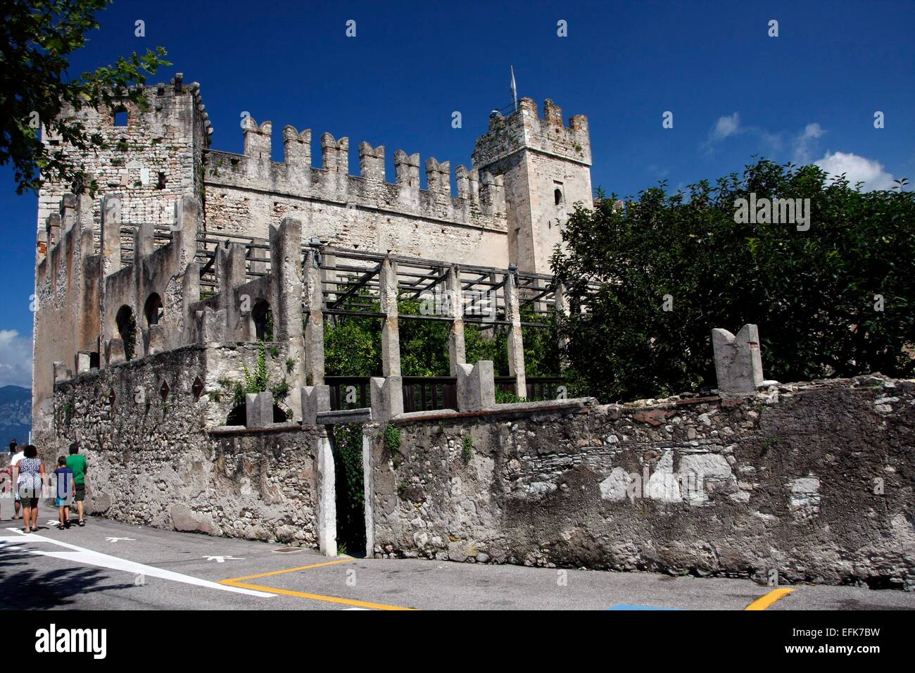 Scaliger Castle in Torri del Benaco was built in 1383 to protect the harbor. Torri del Benaco is a town on the eastern shore of Lake Garda. Photo: Klaus Nowottnick Date: August 27, 2014 Stock Photo
