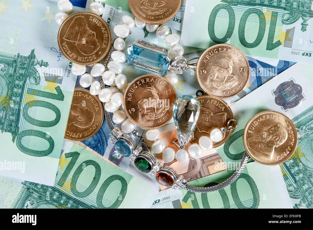 Gold, money and jewelry Stock Photo Alamy