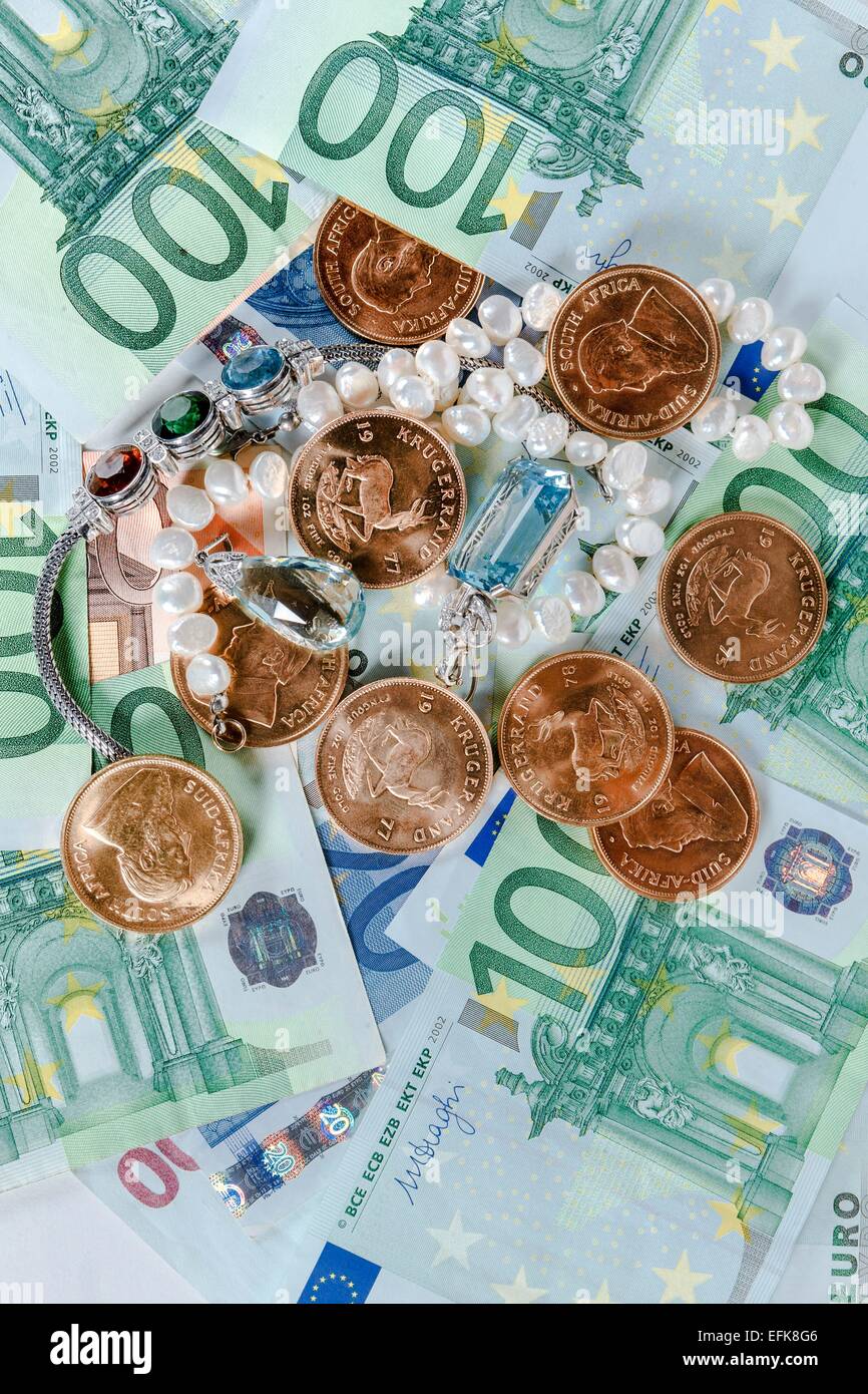 Gold, money and jewelry Stock Photo Alamy