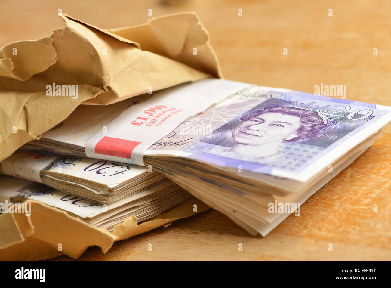 Twenty pound notes in a brown envelope Stock Photo