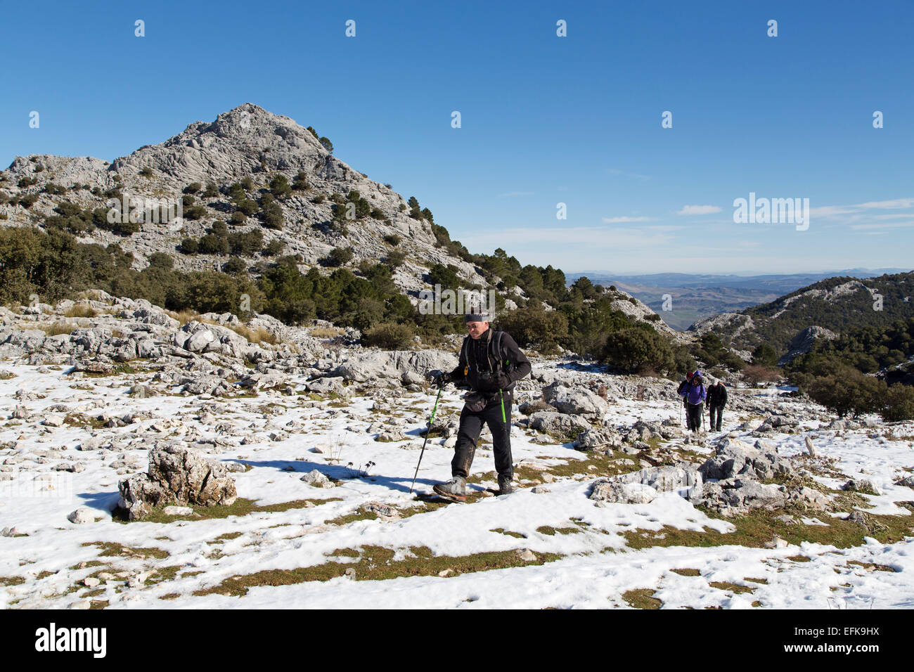 Hikers snow footpath Sierra Grazalema Cadiz Andalusia Spain Stock Photo