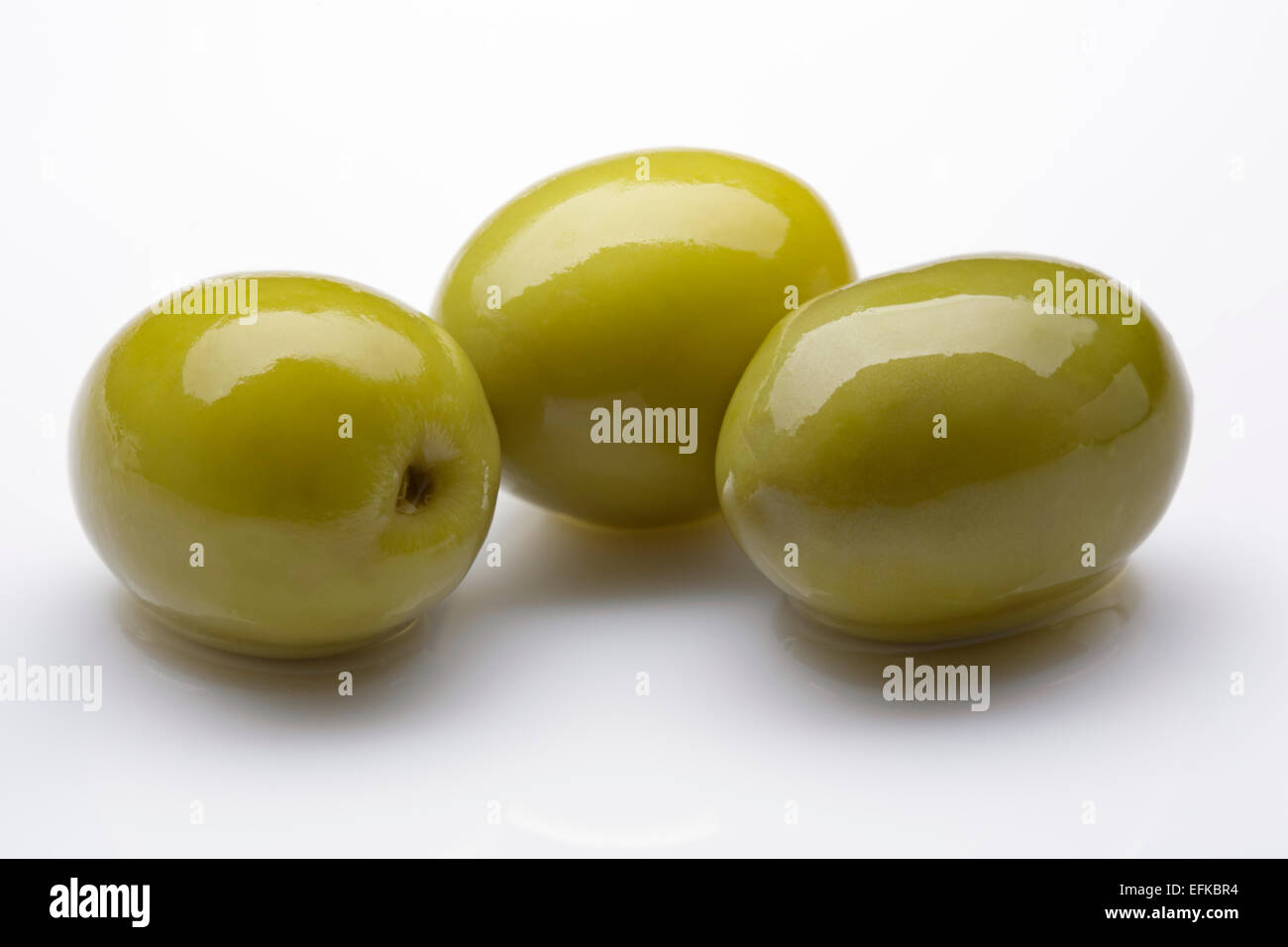 Whole pickled green olives Stock Photo Alamy
