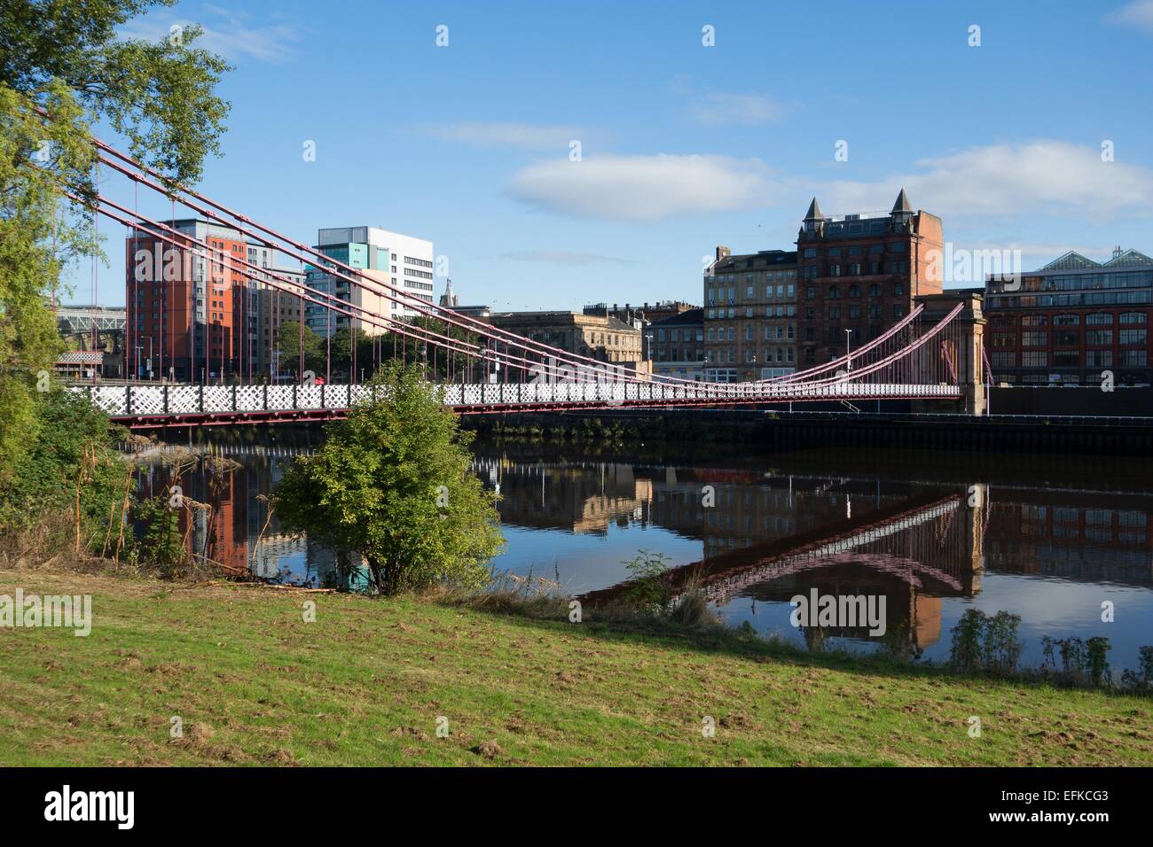 South Portland Street suspension bridge over the river Clyde at Glasgow city centre. Stock Photo
