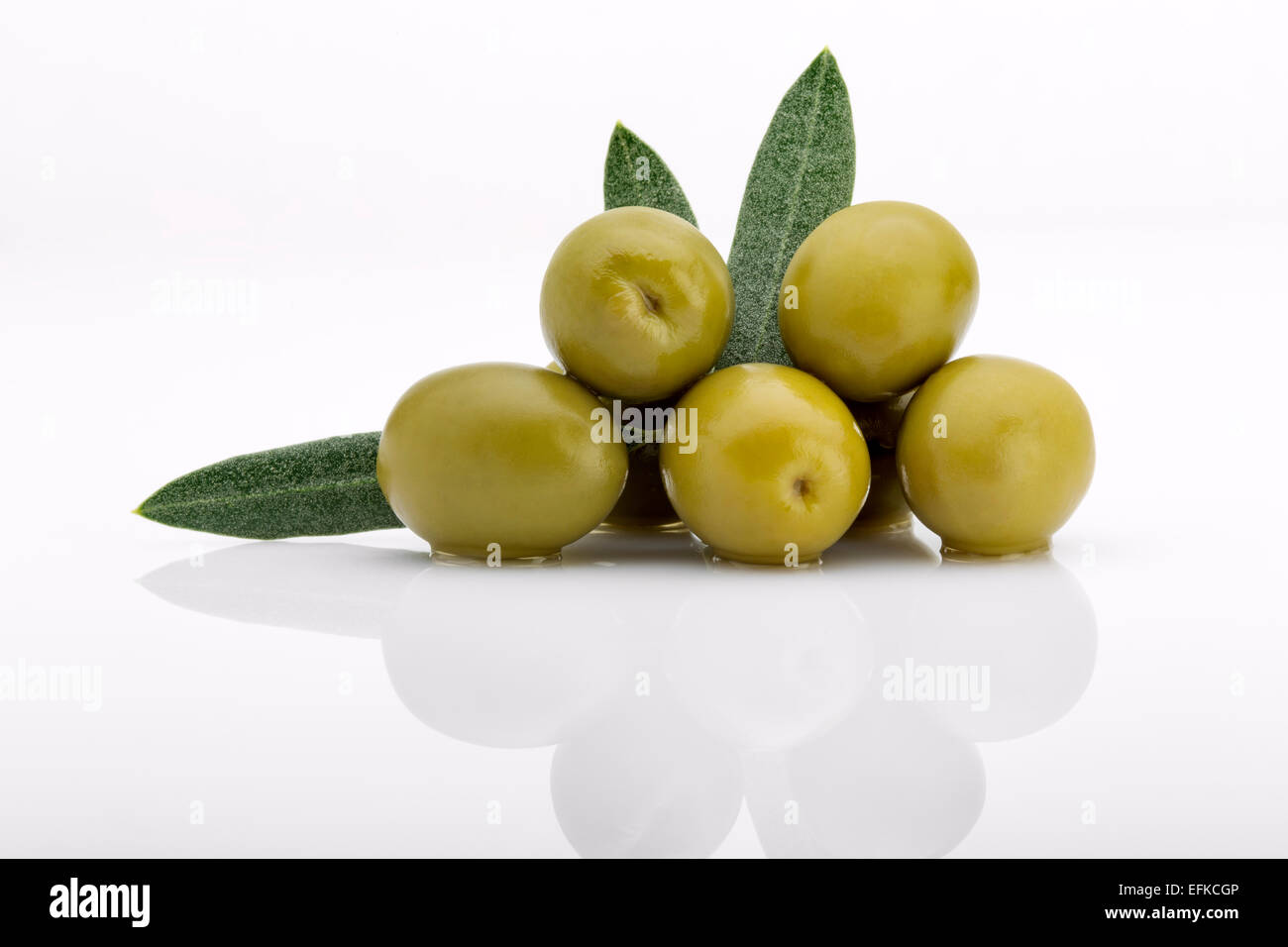 Whole pickled green olives Stock Photo