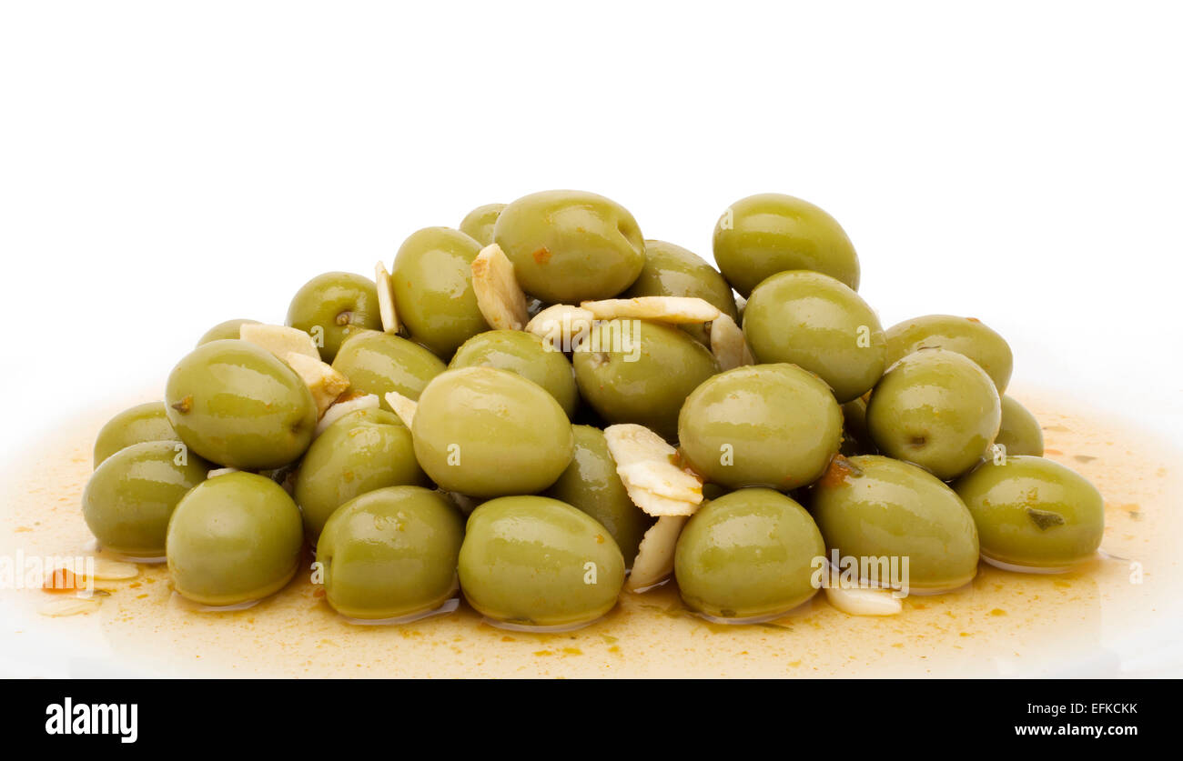 Whole green olives pickled spicy style Stock Photo Alamy