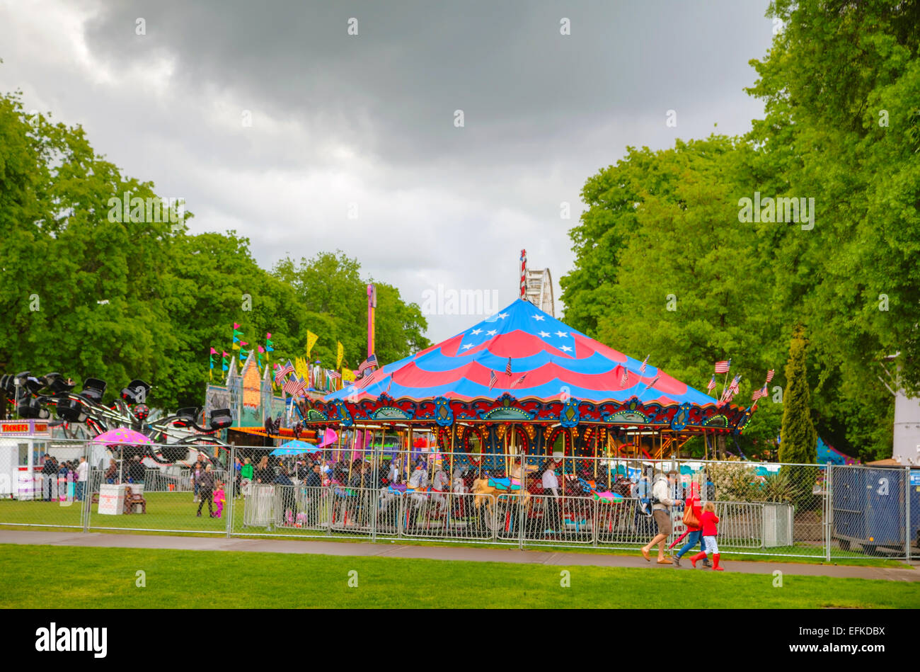 PORTLAND - MAY 04: Amusement park at Governor Tom McCall Waterfront Park on May 04, 2014 in Portland, Oregon. Stock Photo