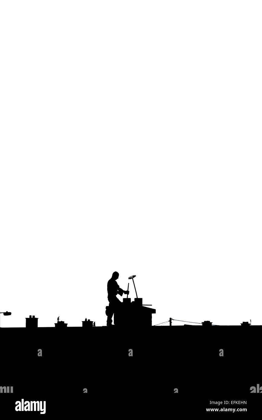 silhouette of a chimney sweep at work on the rooftop of a housing estate on white background Stock Photo