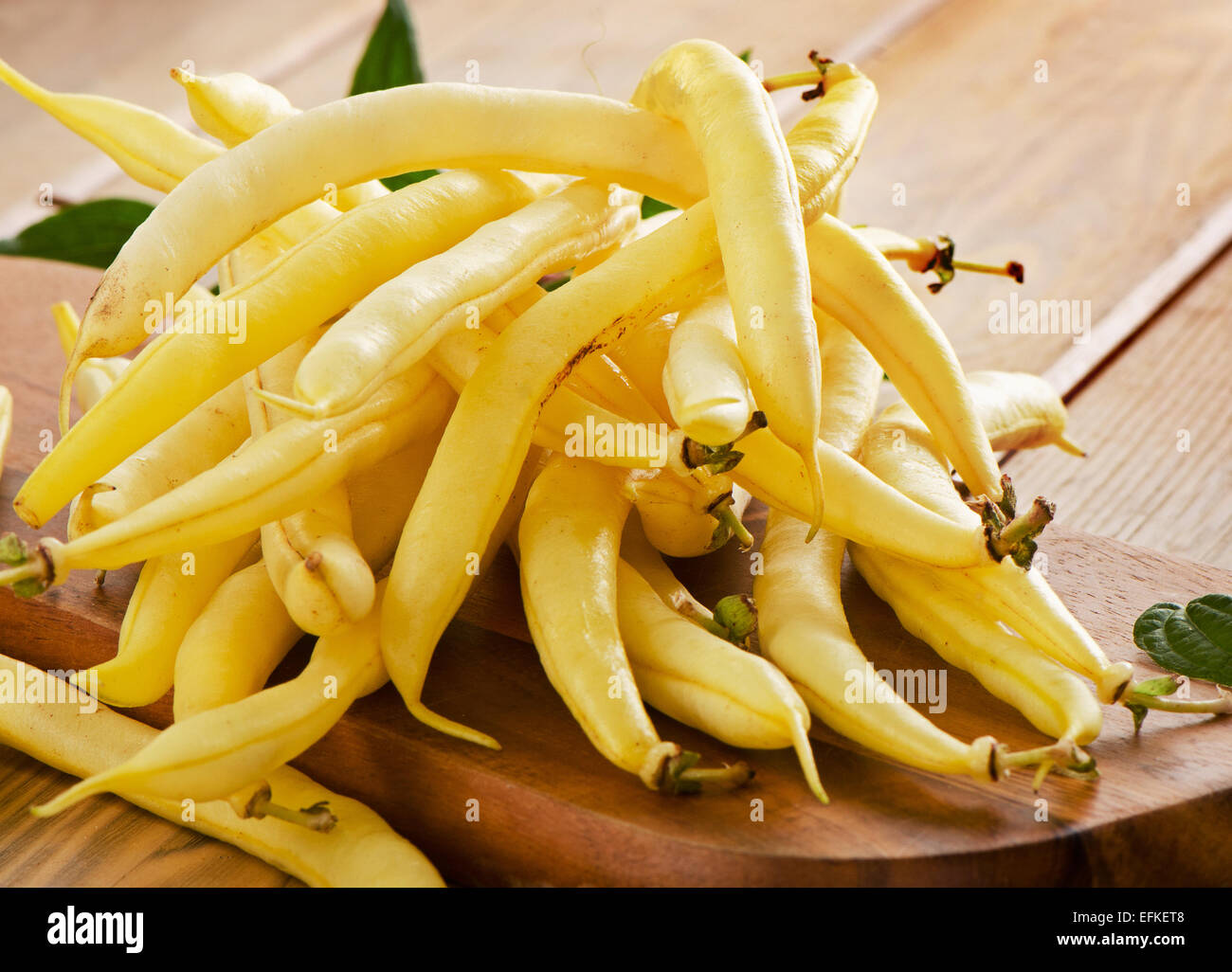 yellow beans on  wooden background. Selective focus Stock Photo