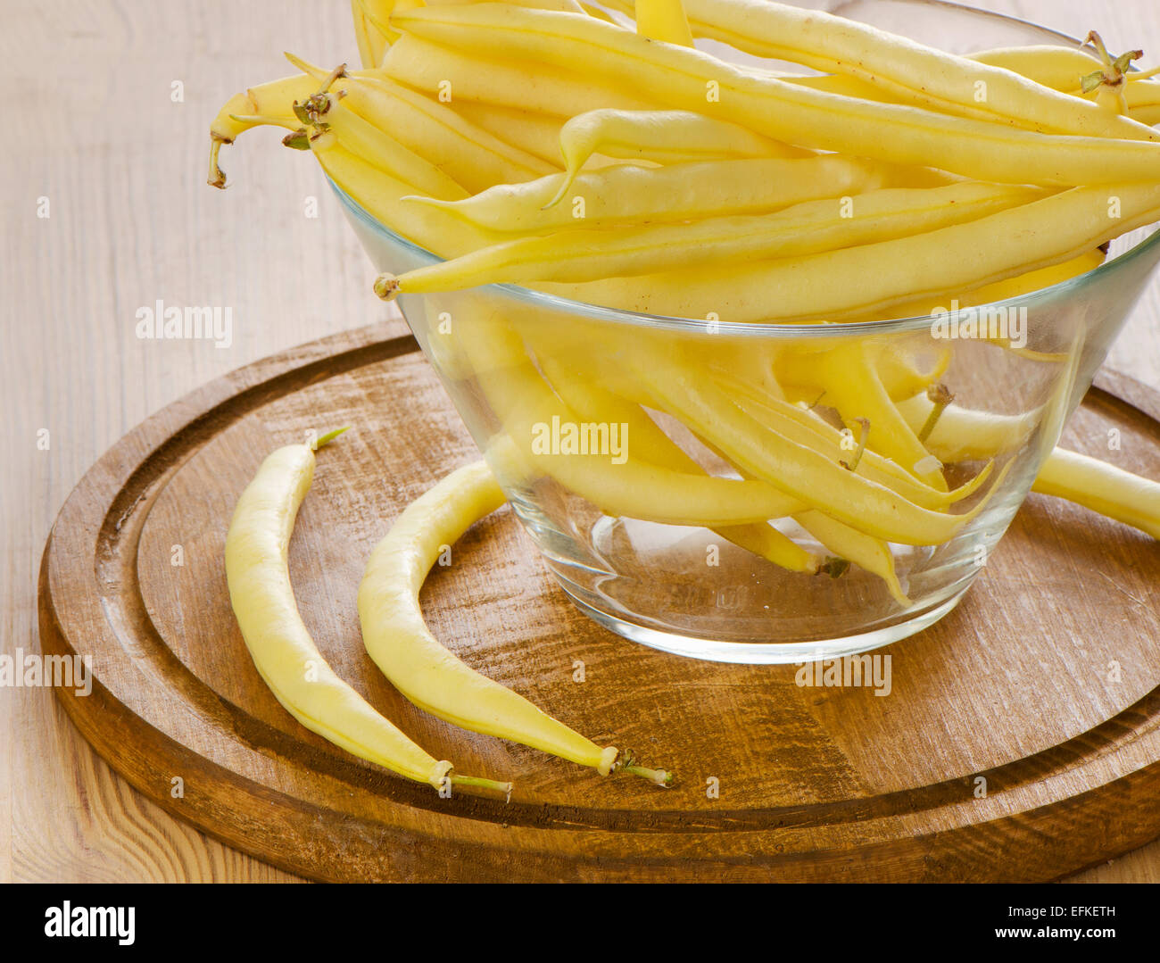yellow beans on a wooden table. Selective focus Stock Photo