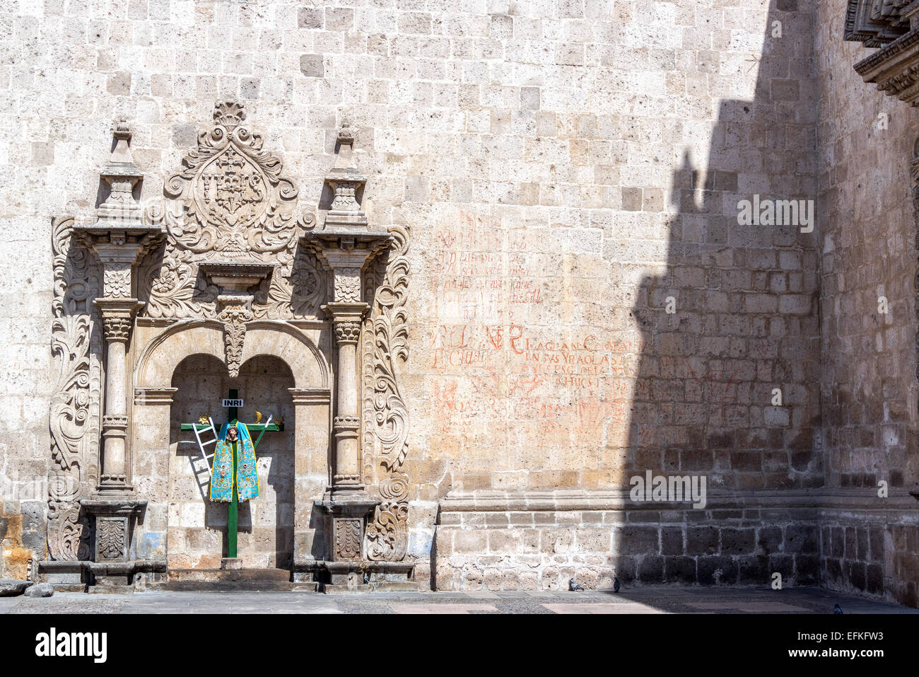 Green cross and church of Santo Domingo in Arequipa, Peru Stock Photo