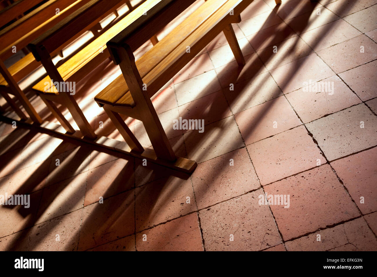 Wooden benches in a church Stock Photo Alamy