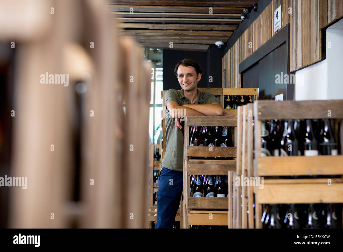 Man working in wine warehouse Stock Photo Alamy