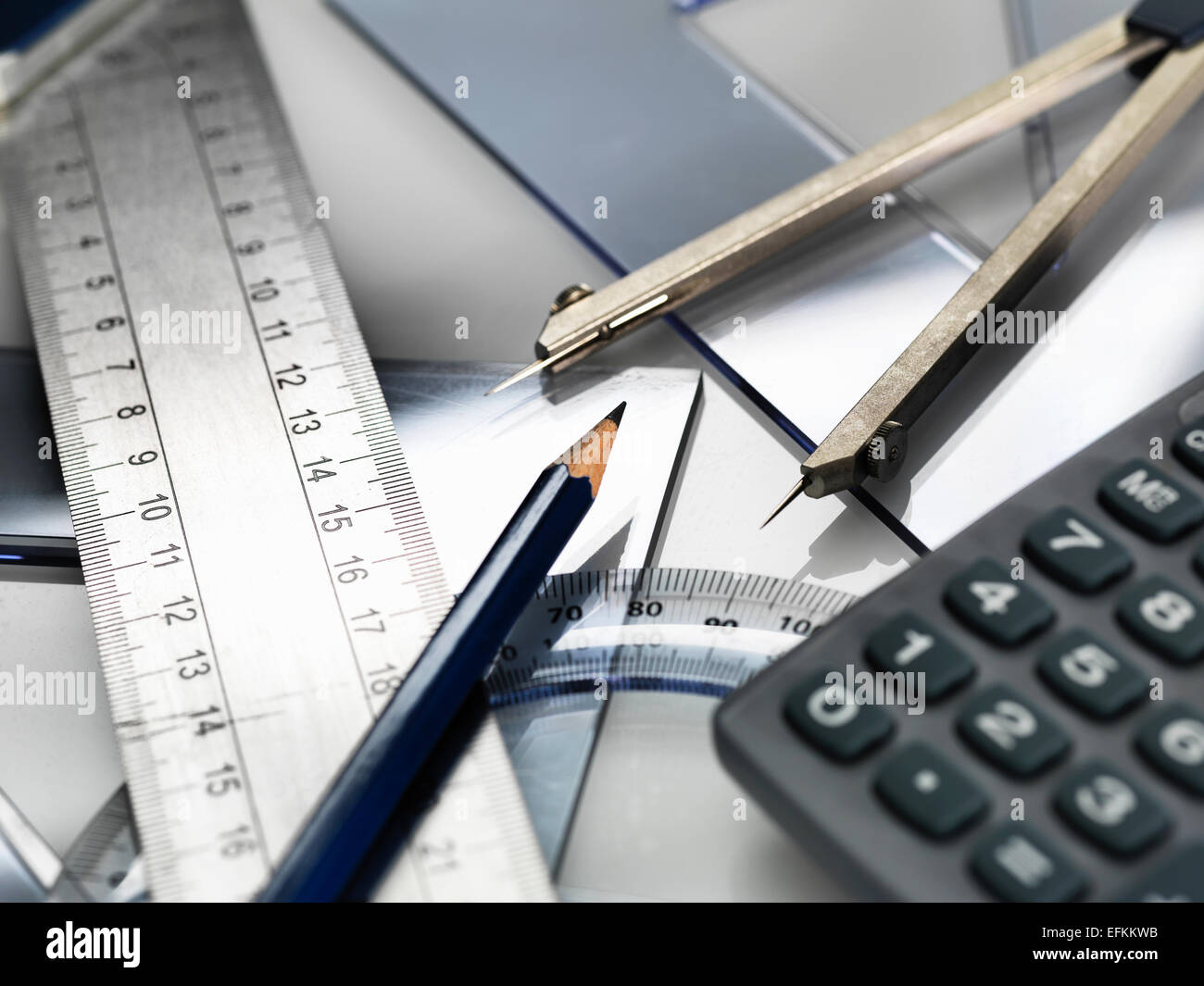 Drawing equipment, sitting on engineering technical drawing Stock Photo