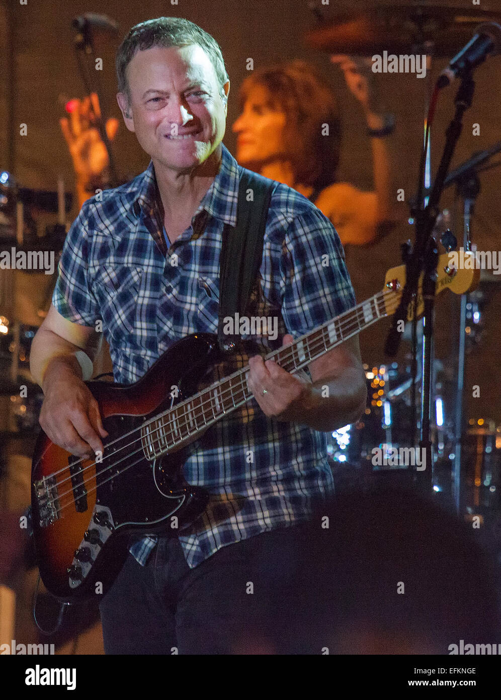 Actor Gary Sinise and the Lt. Dan Band perform for the troops at F.E. Warren Air Force Base August 17, 2014 in Cheyenne, Wyoming. Stock Photo