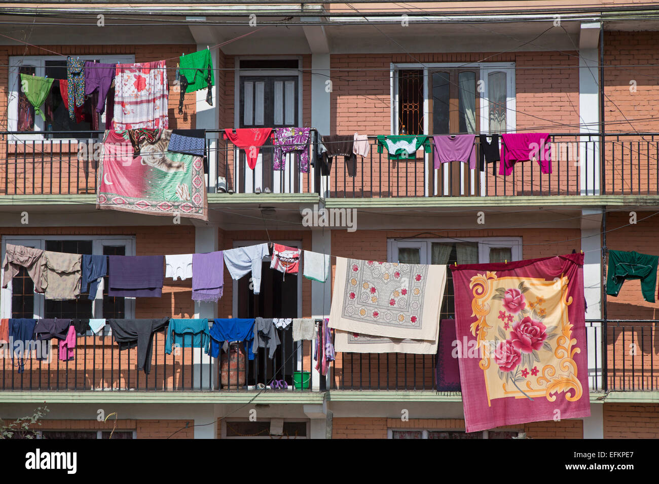 Modern housing in  Kathmandu capital of Nepal and washing hanging to dry Stock Photo