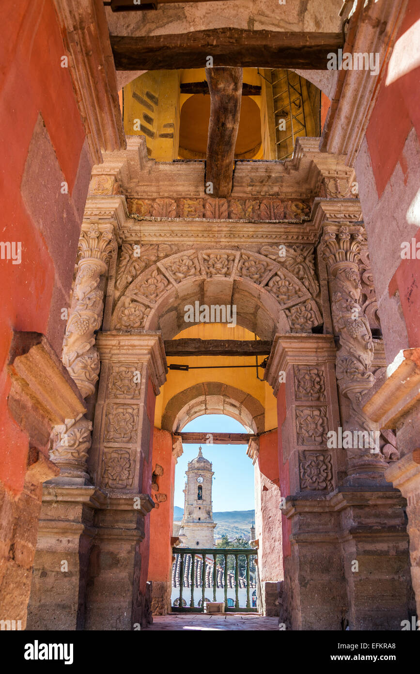 View of a church tower in Potosi, Bolivia with the cathedral visible in the background Stock Photo