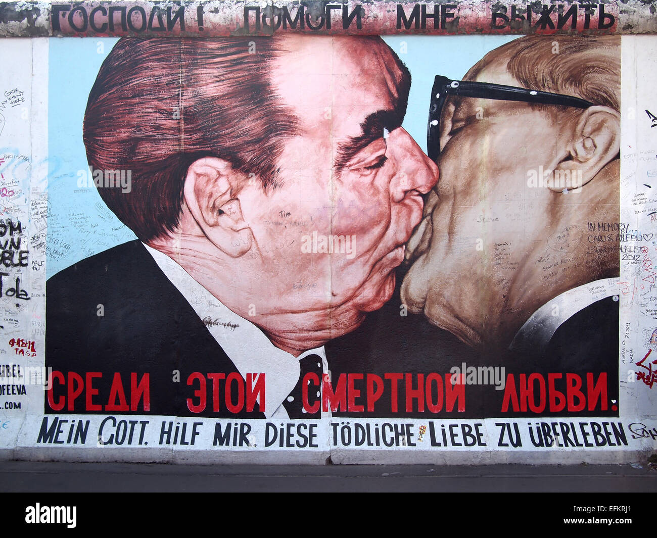 The most famous part of the Berlin Wall. The kiss of Erich Honecker and Leonid Brezhnev, presidents of GDR and USSR. Stock Photo