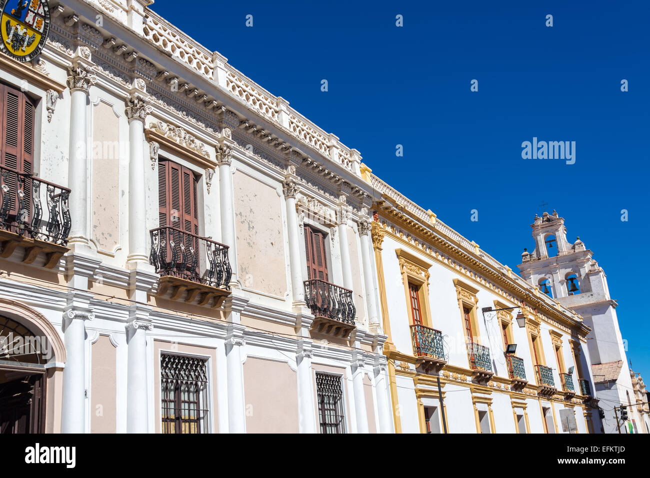 Row of white colonial buildings in Sucre, the White City of Bolivia Stock Photo