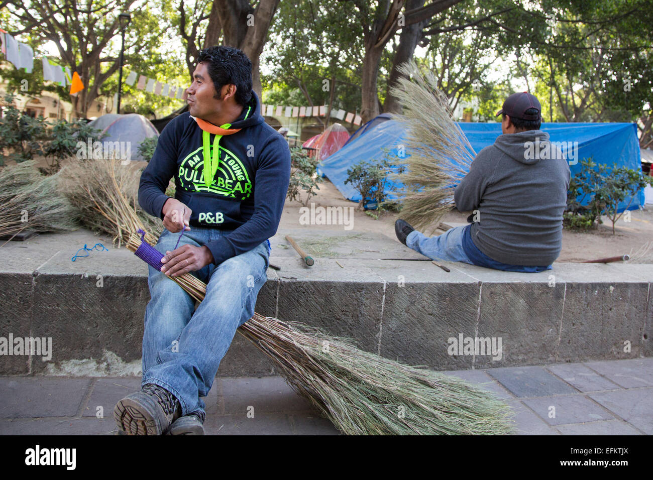 Oaxaca, Mexico Workers make brooms for street sweeping Stock Photo