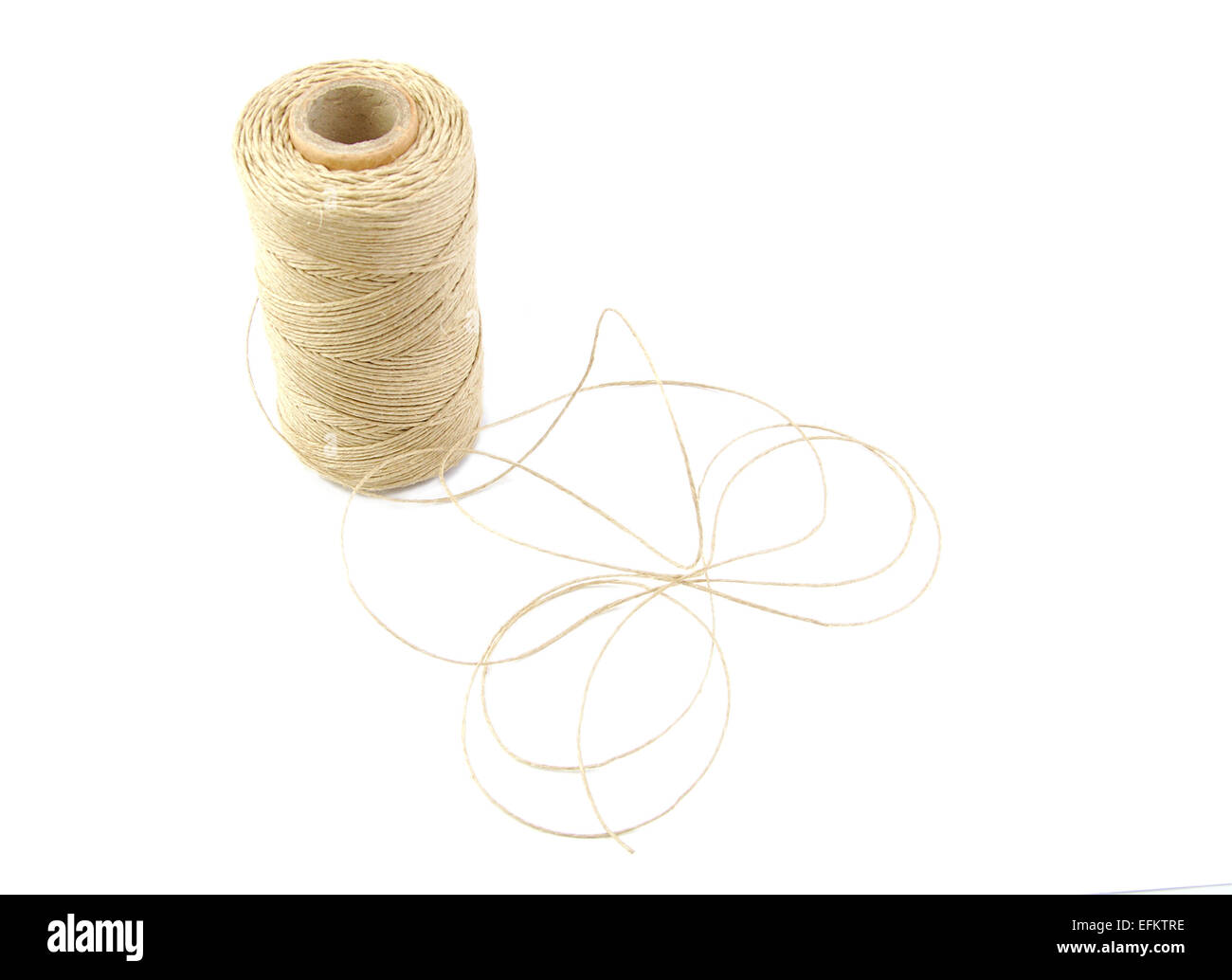 Roll of twine cord on a white background Stock Photo