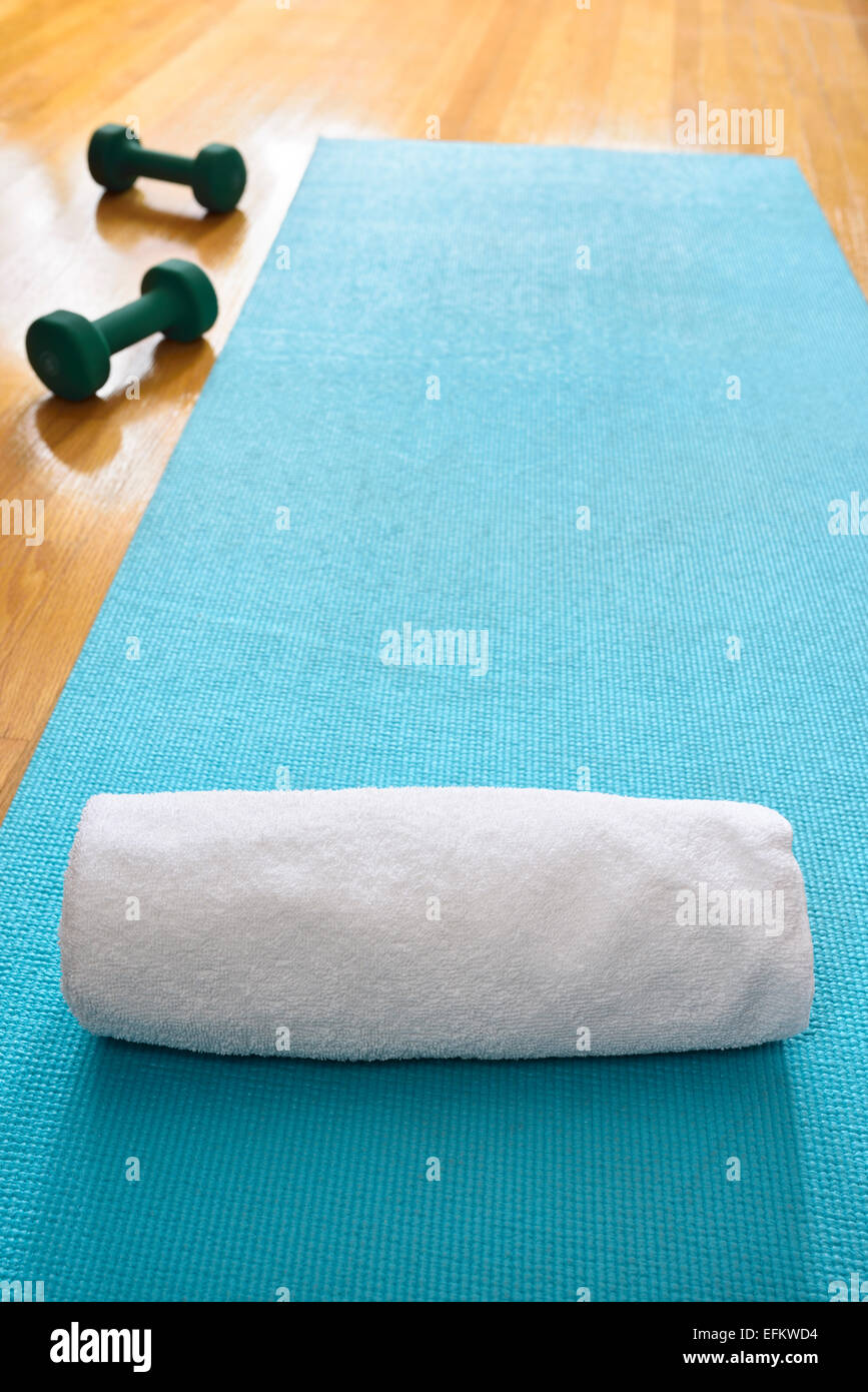 Blue Yoga Exercise Mat In Gym Studio With Hardwood Floor Fresh