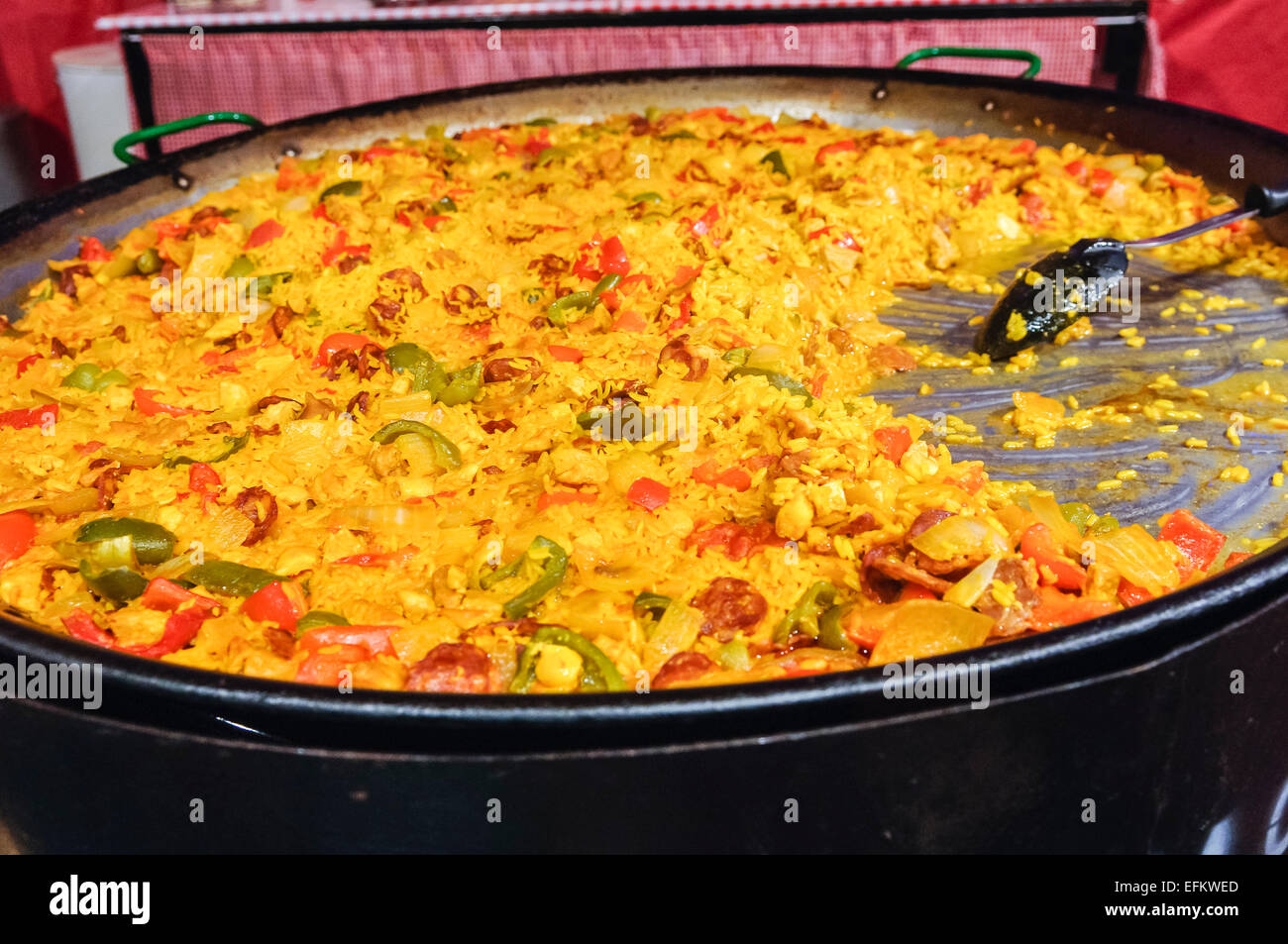 A pan cooking paella at a market stall Stock Photo Alamy