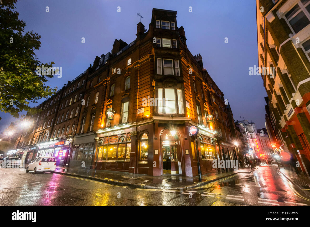 Duke of Argyll Pub in Soho, Dusk , Rainy Day, City of London, United Kingdom Stock Photo