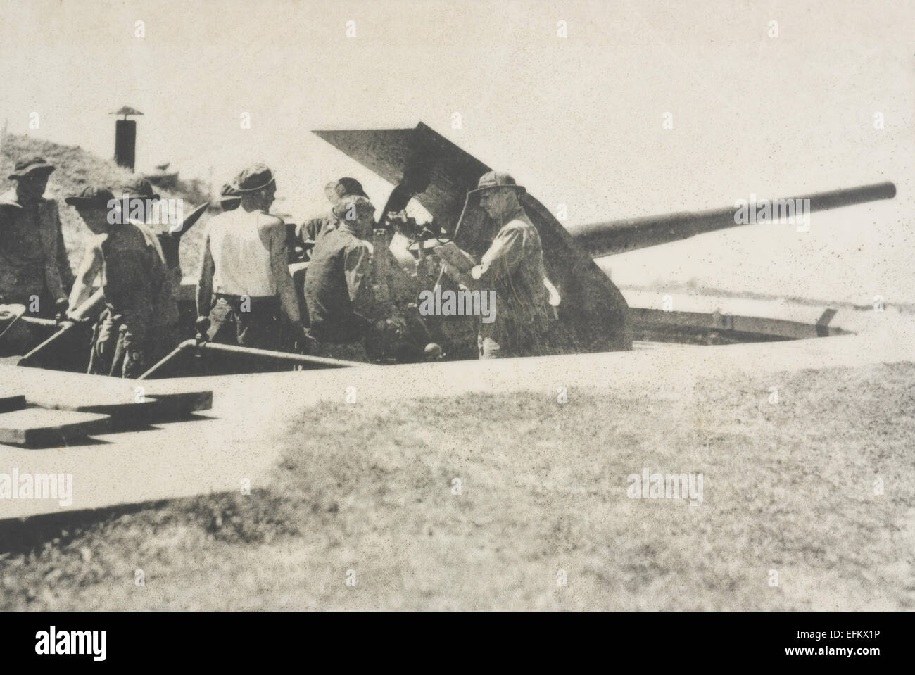 Information board monochrome photograph World War 2 soldiers loading