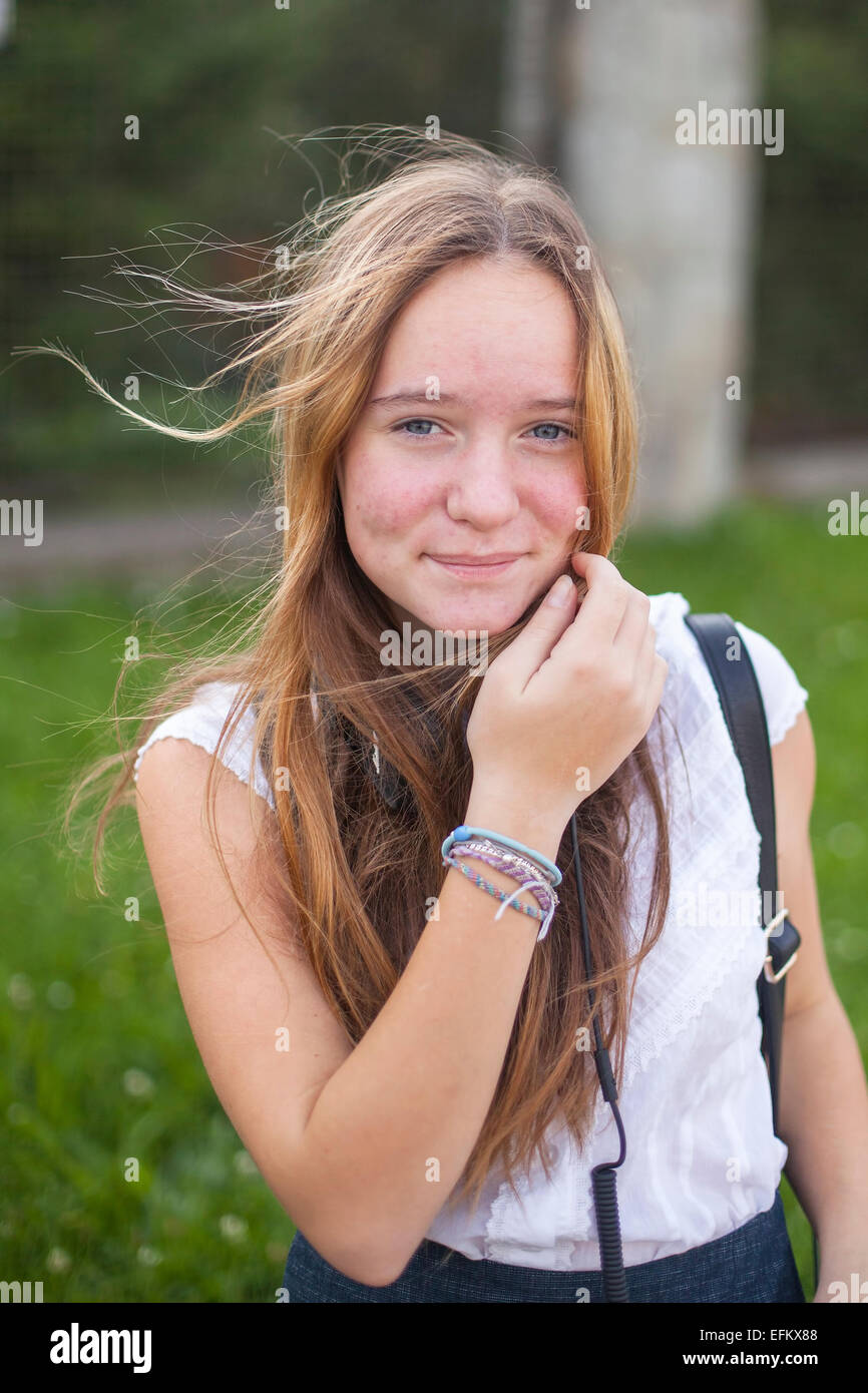 Young cute teen girl portrait outdoors. Stock Photo