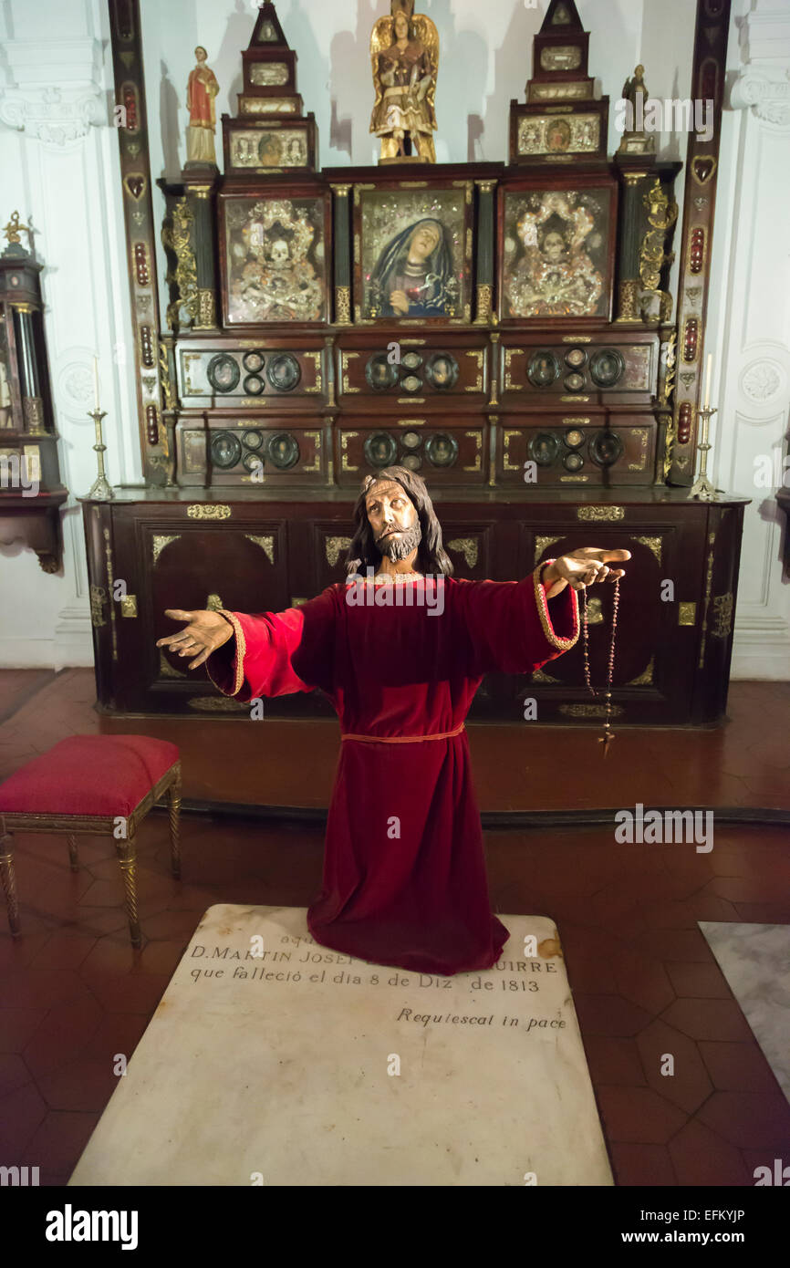 Statue of a kneeling figure of supplicant Christ in Nuestra Señora del Pilar Church in Recoleta district, downtown Buenos Aires, Argentina Stock Photo