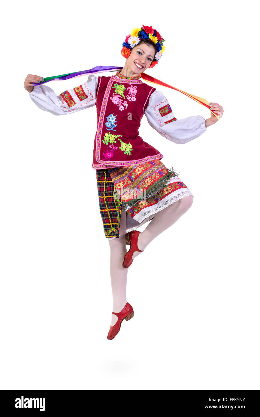 beautiful dancing girl in ukrainian polish national traditional costume clothes happy smile, full length portrait isolated Stock Photo