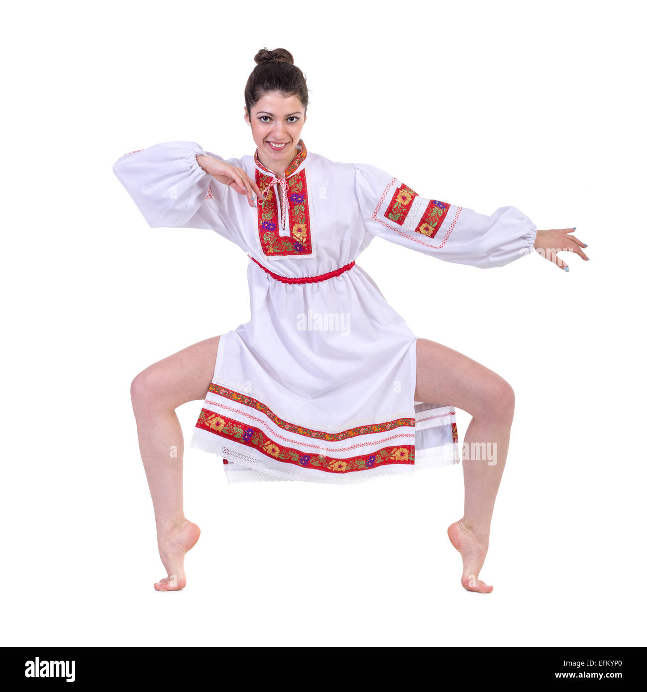 beautiful dancing girl in ukrainian polish national traditional costume clothes happy smile, full length portrait isolated Stock Photo