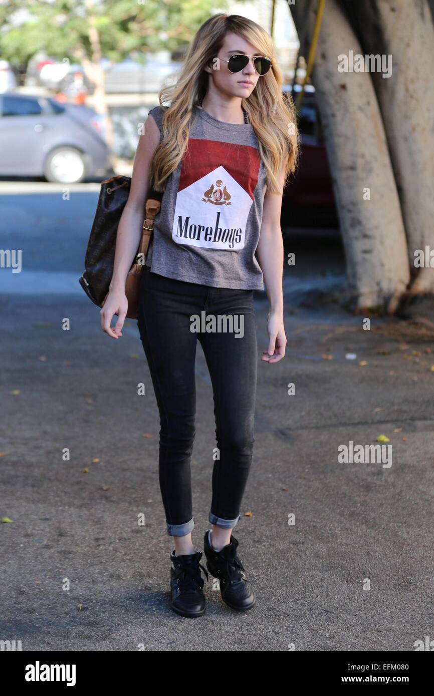 Emma Roberts Exits The Nine Zero One Salon Wearing A More Boys Sleeveless Shirt Made To Look Like A Pack Of Marlboro Cigarettes Featuring Emma Roberts Where Los Angeles California United States Emma Roberts Exits The Nine Zero One Salon Wearing A More Boys Sleeveless Shirt Made To Look Like A Pack Of Marlboro Cigarettes Featuring Emma Roberts Where Los Angeles California United States