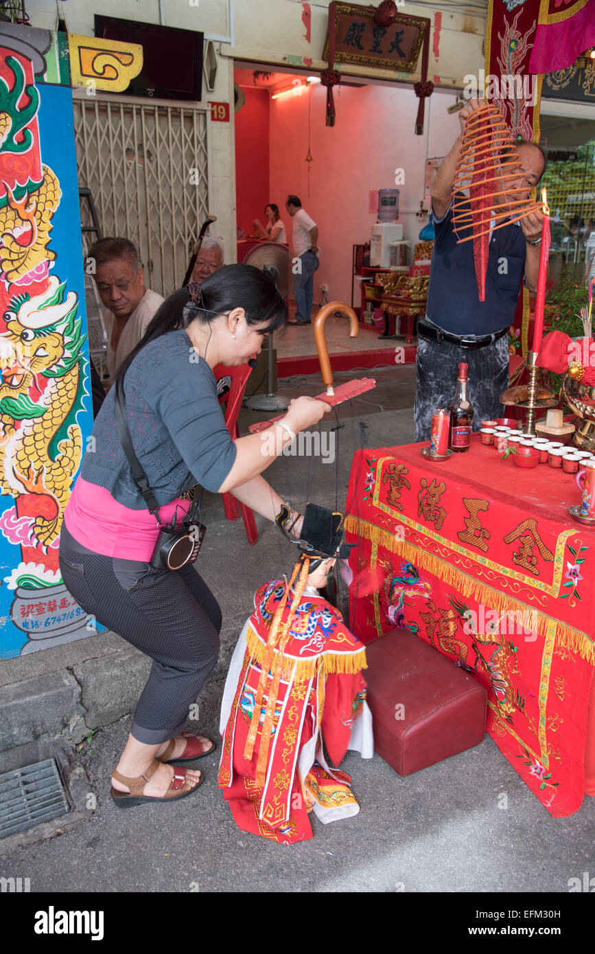 Preparations in community association altar for Chinese New Year in Singapore Stock Photo