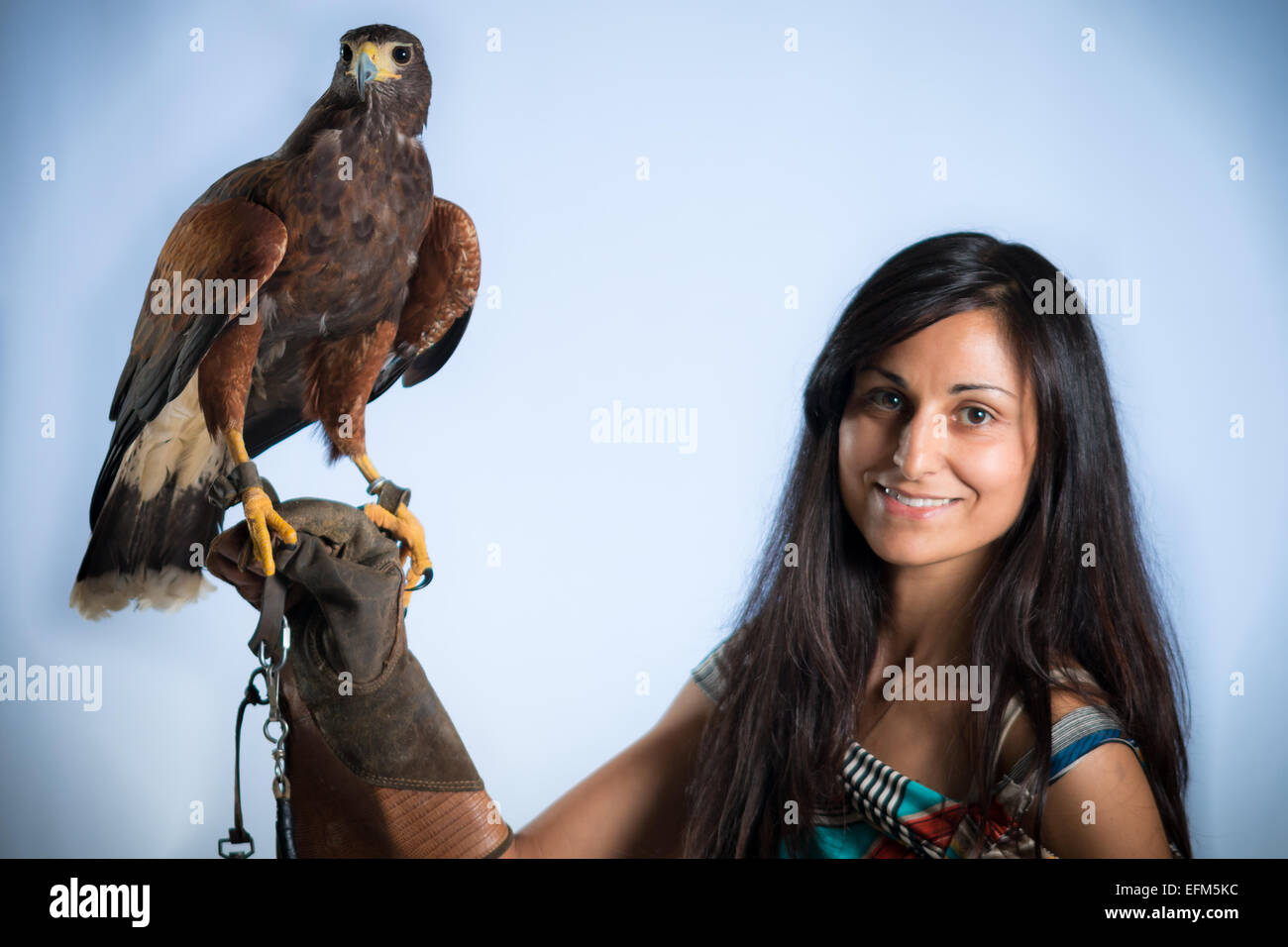 Woman and buzzard Stock Photo Alamy