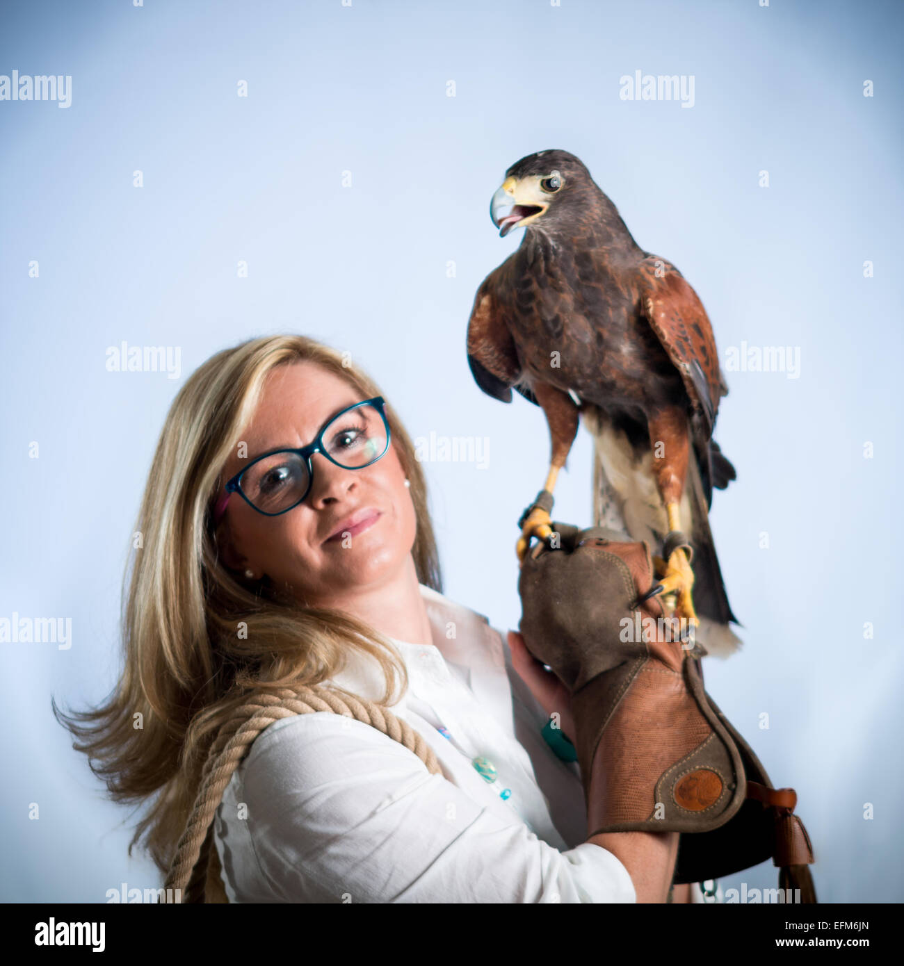 Woman and buzzard Stock Photo Alamy