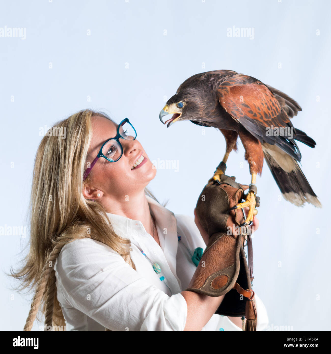 Woman and buzzard Stock Photo Alamy