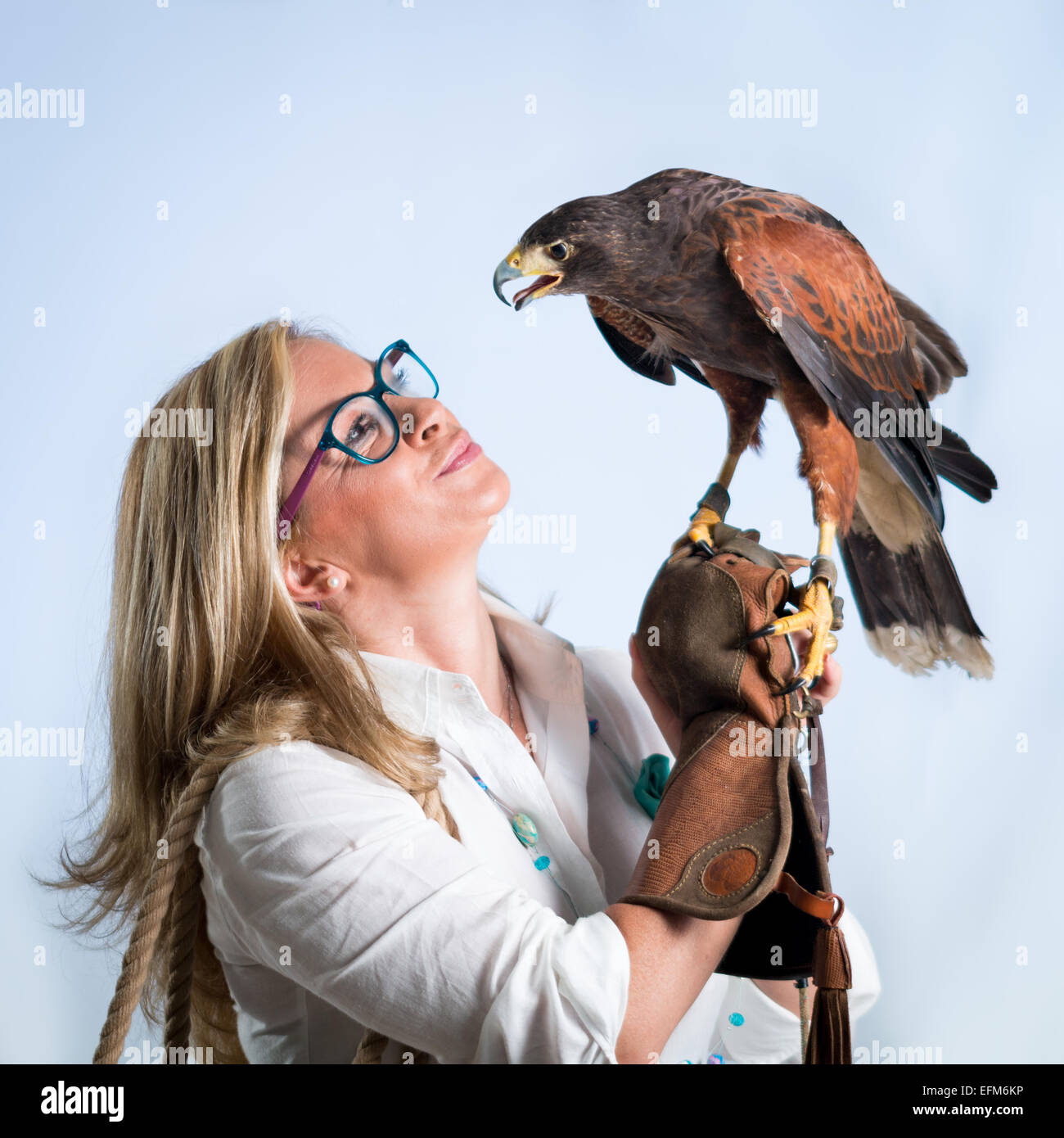 Woman and buzzard Stock Photo Alamy