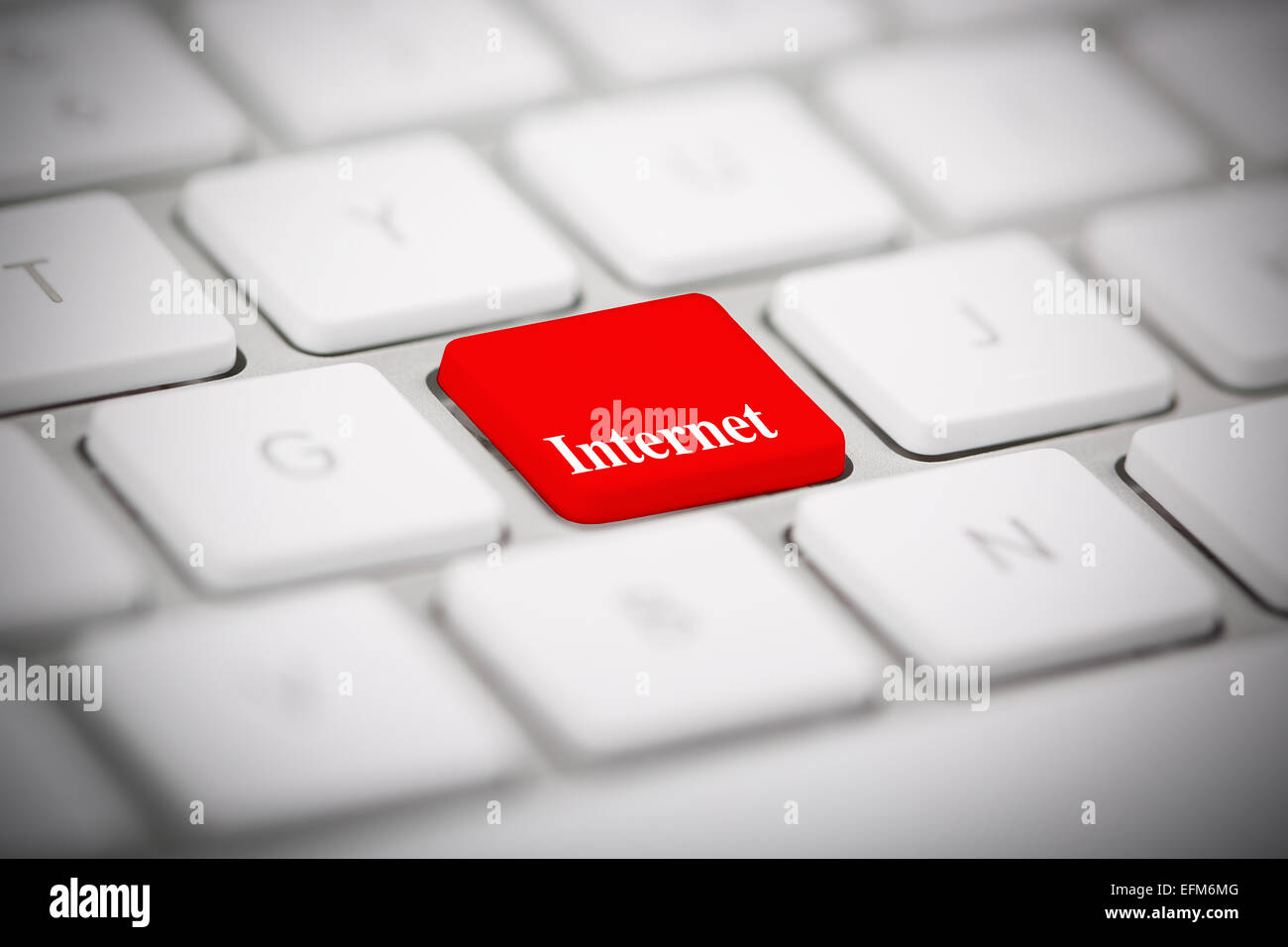 The word 'INTERNET' written on metallic keyboard. Stock Photo