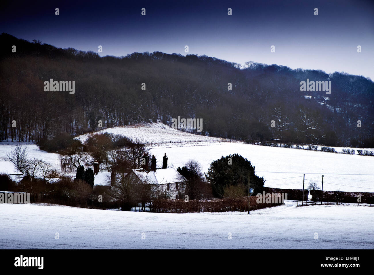 A Winter snow covered landscape in Hertfordshire countryside near Aldbury. Stock Photo