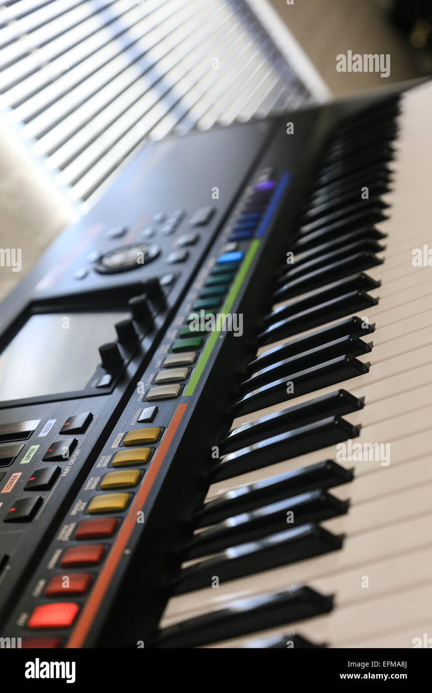 Keyboard Potrait perspective down keyboard with blinds in background Stock Photo - Alamy