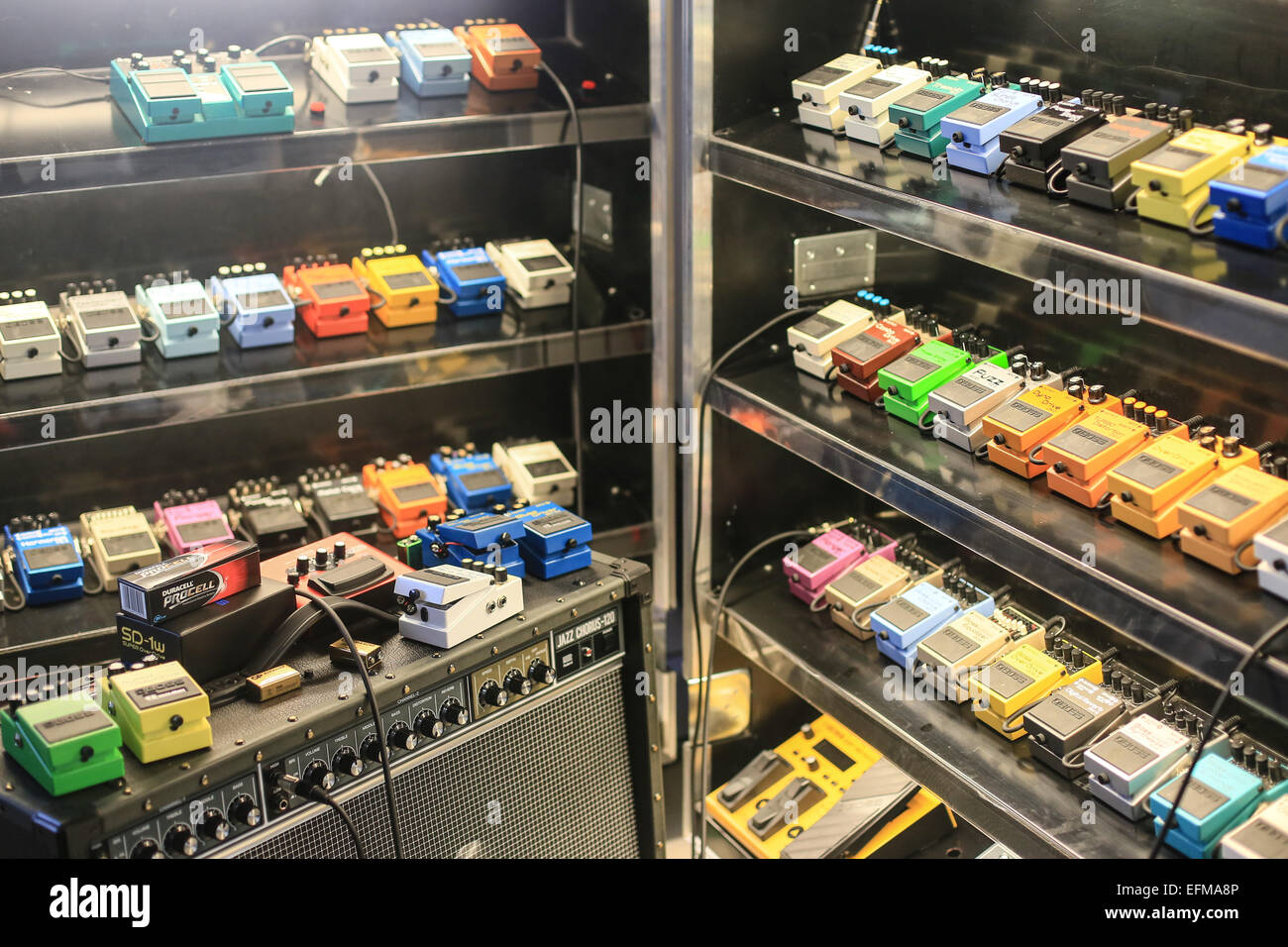 colourful selection of guitar pedals and amp Stock Photo
