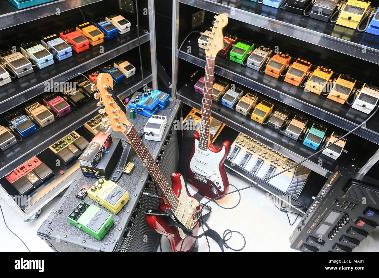 selection of guitar pedals, guitar and amp Stock Photo